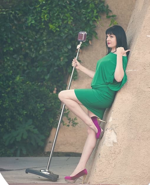 Molly Mahoney, who puts on the camera confidence course, leaning on a wall